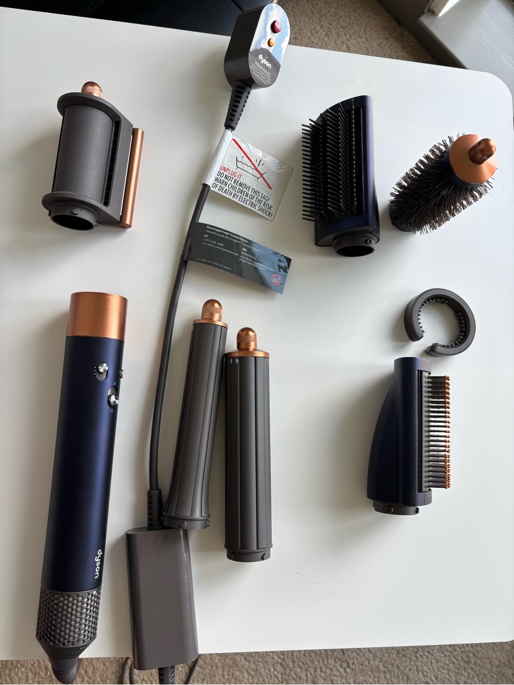 Dyson multi-styler set in navy and copper tones